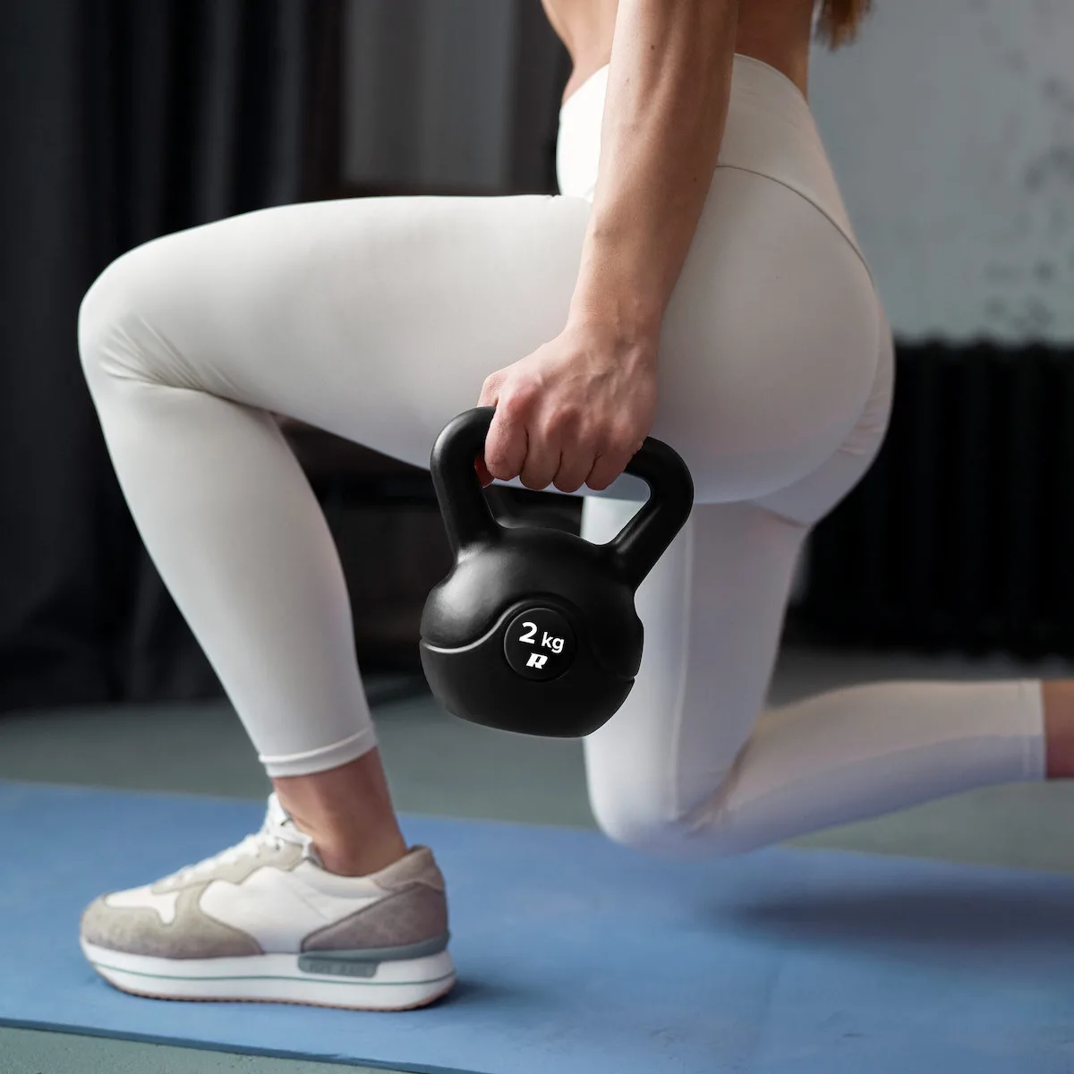20241210090731_a8066090 12 Kg Bituminous Kettlebell Rebel Active - Image 1